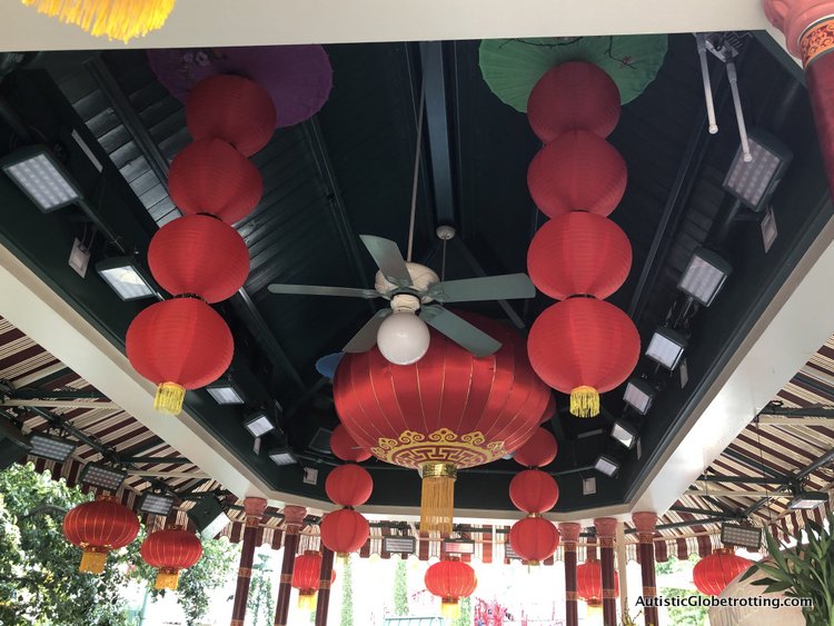 Attending Disneyland's Lunar Year Celebrations with Autism red fabric decorations