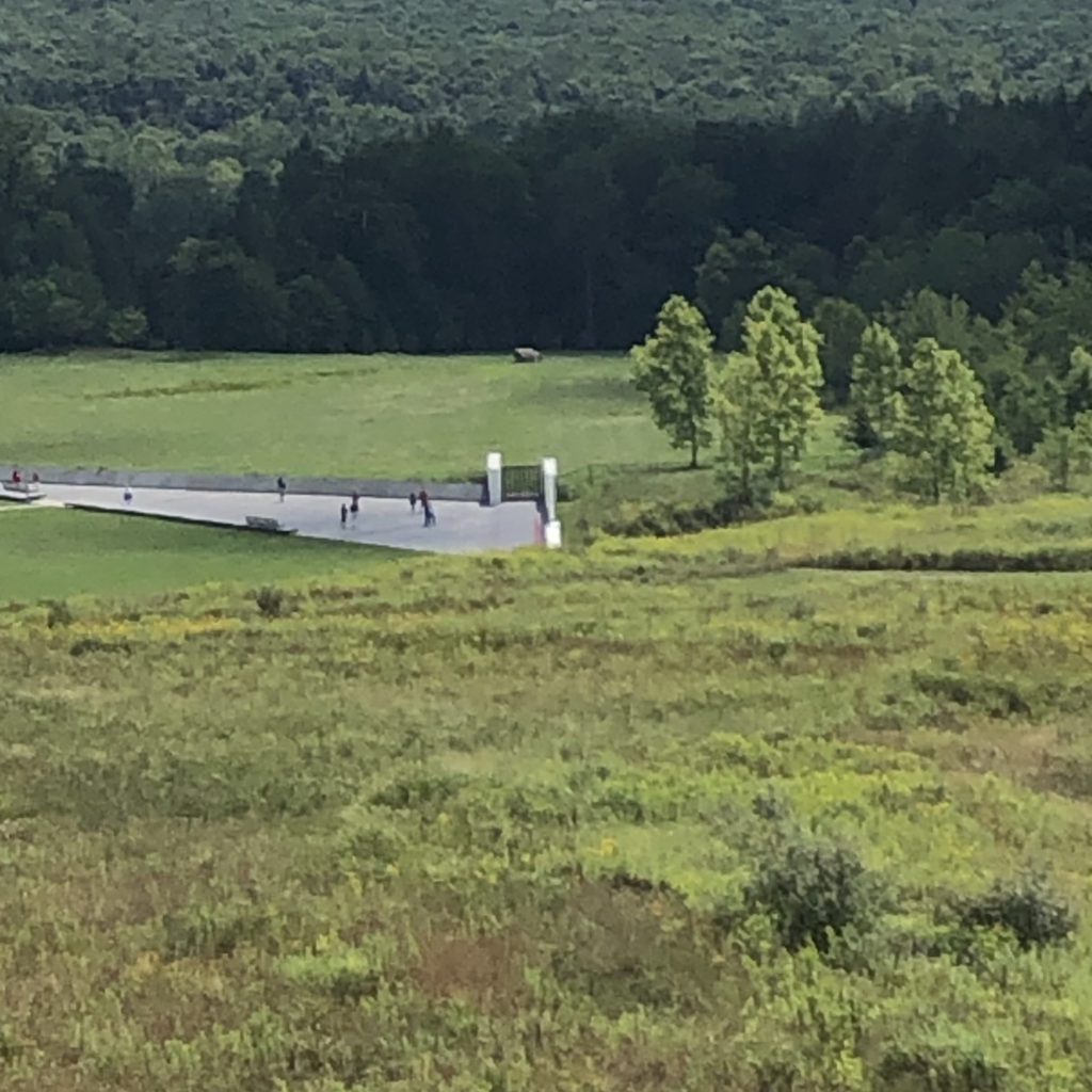view in the 93 memorial field looking down at the deck and tree line.
